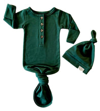 Image of infant organic cotton gown in forest green color. Knotted green gown with matching knotted green hat.