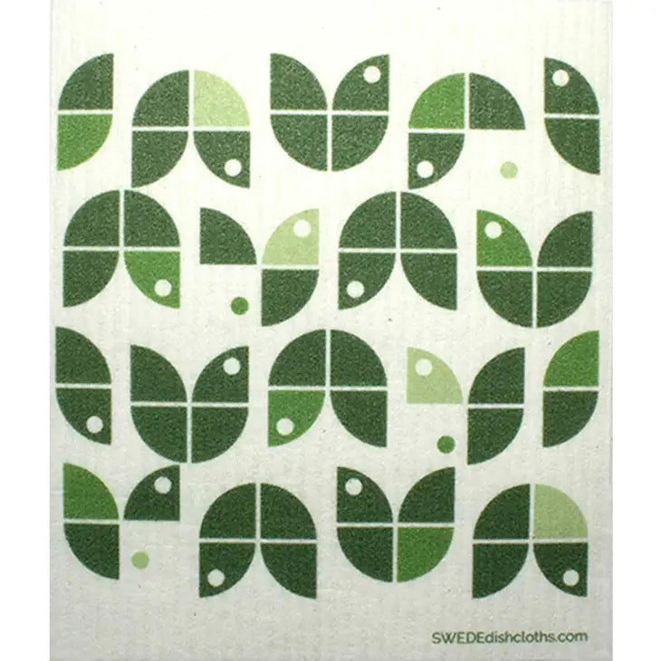 Image of white Swedish dishcloth with various shades of green geometric shaped tulips printed on it.