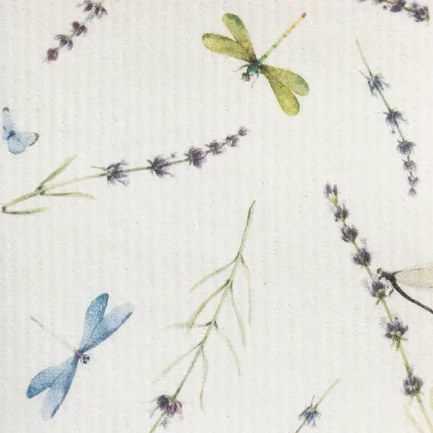 Image of white Swedish dishcloth with dragonflies and lavender printed on it.