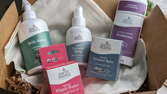 image of gift box with pregnancy care items, including lavender deodorant, perineal Spray, nipple butter, perineal balm, and belly butter.  Products all made by Earth Mama Organics.
