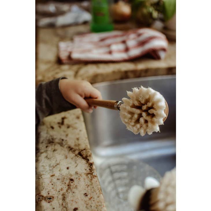 image of sudsy sisal bristles of dish scrubber.