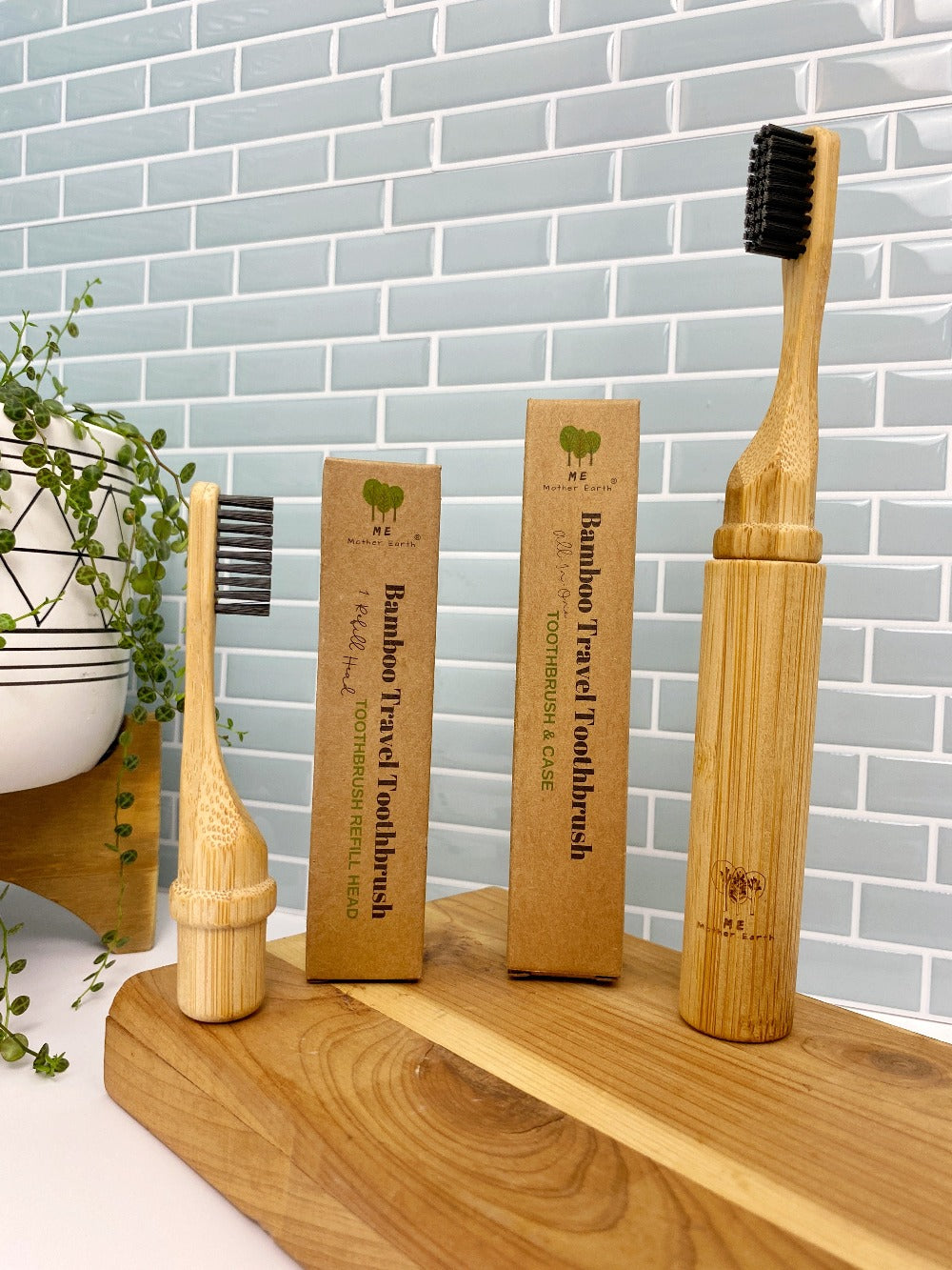 image of bamboo travel toothbrush with cardboard packaging.